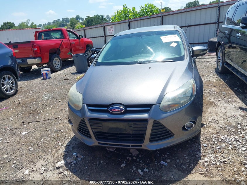 2014 Ford Focus Titanium VIN: 1FADP3N25EL410233 Lot: 39777290