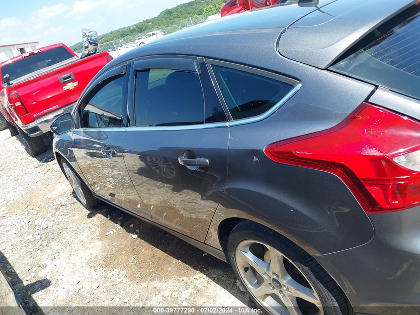 2014 Ford Focus Titanium VIN: 1FADP3N25EL410233 Lot: 39777290