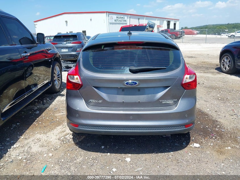 2014 Ford Focus Titanium VIN: 1FADP3N25EL410233 Lot: 39777290