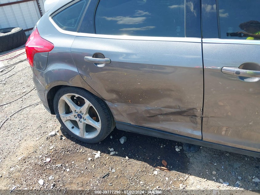 2014 Ford Focus Titanium VIN: 1FADP3N25EL410233 Lot: 39777290