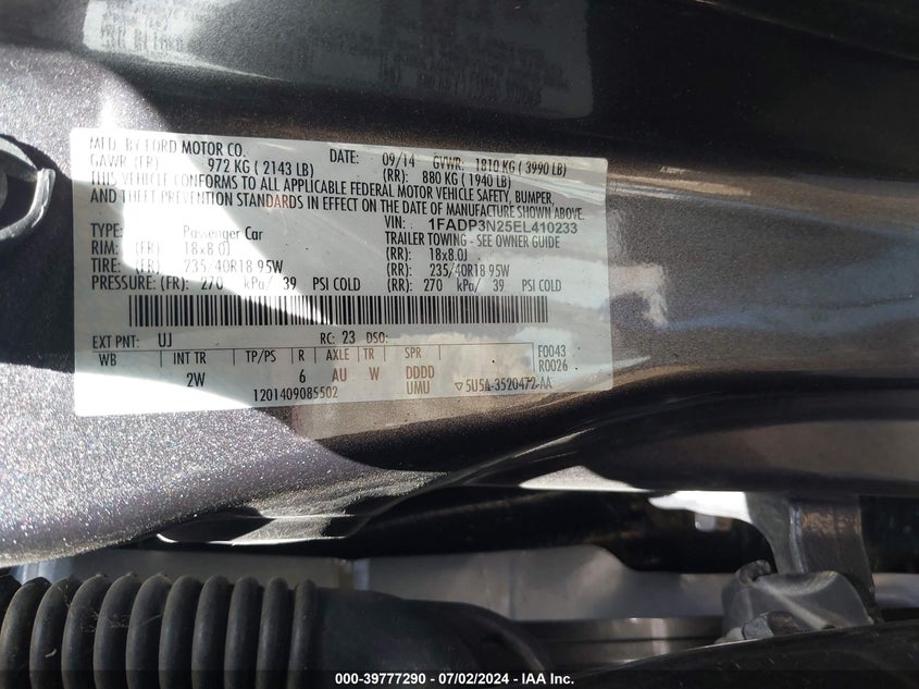 2014 Ford Focus Titanium VIN: 1FADP3N25EL410233 Lot: 39777290