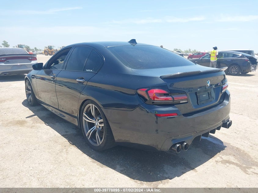 2013 BMW M5 VIN: WBSFV9C50DD097053 Lot: 39778895