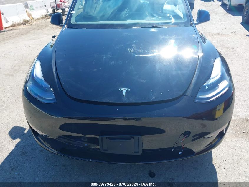 2024 Tesla Model Y VIN: 7SAYGDEE1RF982214 Lot: 39779423