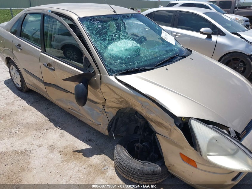 2001 Ford Focus Lx VIN: 1FAFP33P21W380267 Lot: 39779691