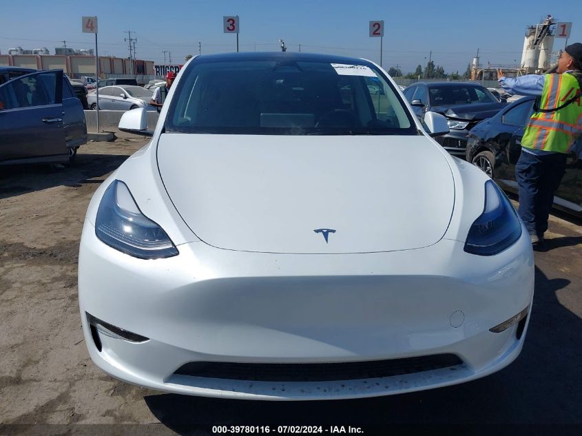 2024 Tesla Model Y Long Range Dual Motor All-Wheel Drive VIN: 7SAYGAEE7RF983446 Lot: 39780116