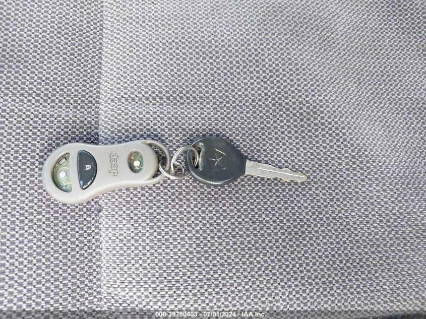 1999 Jeep Grand Cherokee Laredo VIN: 1J4GW58S9XC521656 Lot: 39780403