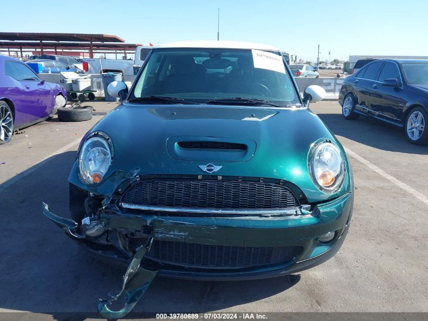 2009 Mini Cooper S VIN: WMWMF735X9TW82135 Lot: 39780689