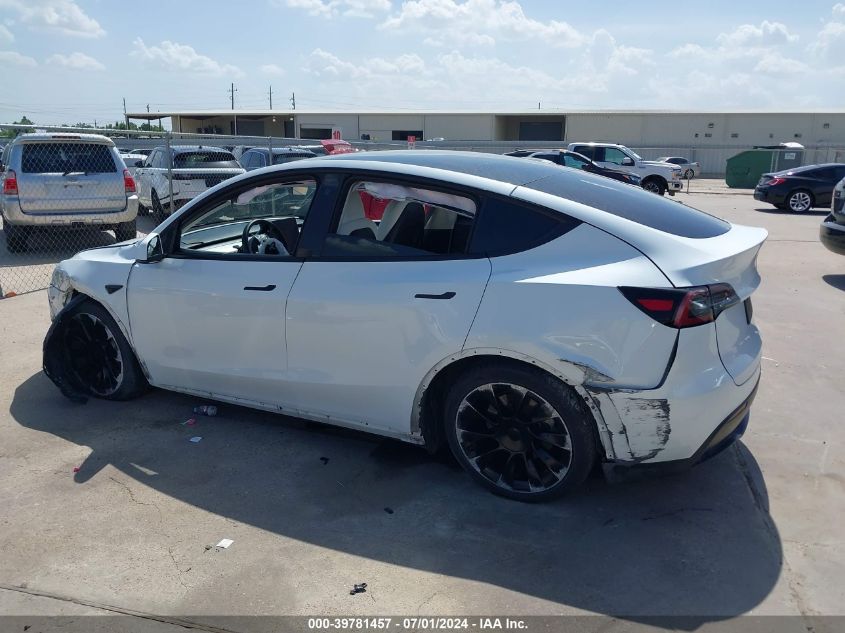 2023 Tesla Model Y Awd/Long Range Dual Motor All-Wheel Drive VIN: 7SAYGDEE6PF632347 Lot: 39781457