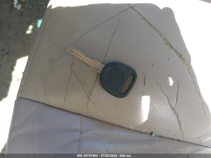 2003 Chevrolet Tahoe Lt VIN: 1GNEC13Z33R244133 Lot: 39781604