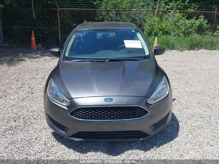 2018 Ford Focus S VIN: 1FADP3E25JL258318 Lot: 39782970