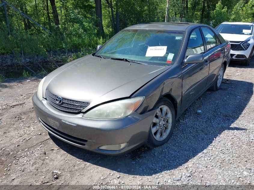 2003 Toyota Camry Xle VIN: 4T1BE30K03U768292 Lot: 39786661
