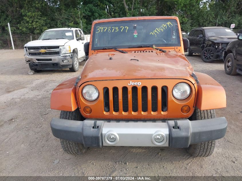 2011 Jeep Wrangler Unlimited Sahara VIN: 1J4BA5H15BL638353 Lot: 39787379
