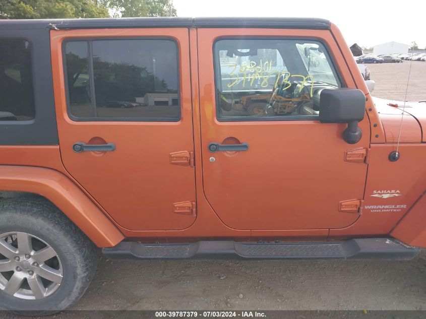 2011 Jeep Wrangler Unlimited Sahara VIN: 1J4BA5H15BL638353 Lot: 39787379