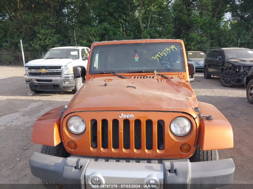 2011 Jeep Wrangler Unlimited Sahara VIN: 1J4BA5H15BL638353 Lot: 39787379