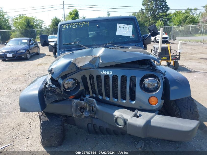 2007 Jeep Wrangler Unlimited Sahara VIN: 1J4GA59147L184933 Lot: 39787594