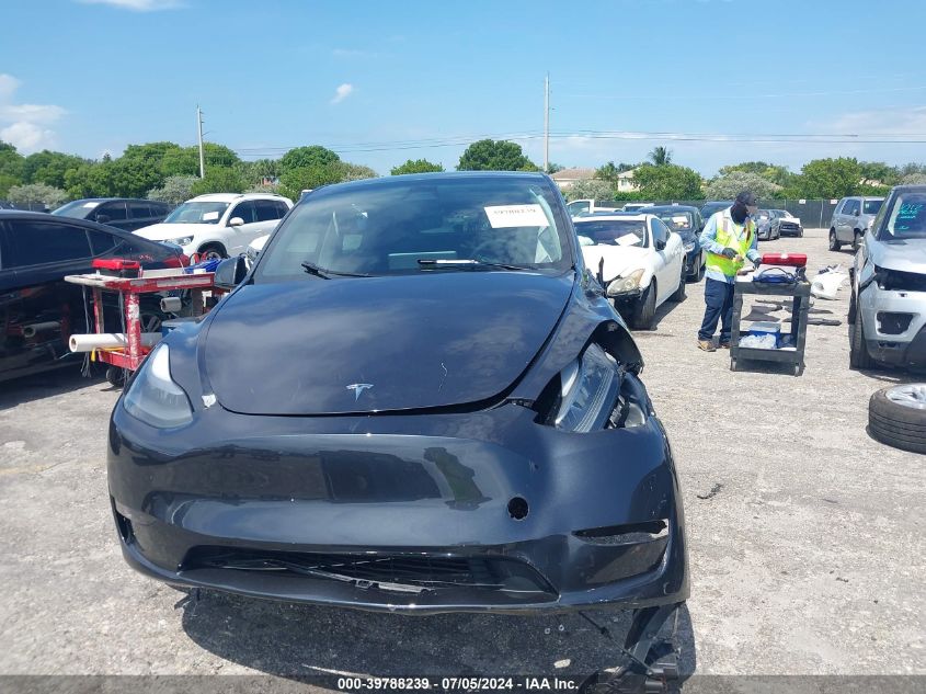 2024 Tesla Model Y Long Range Dual Motor All-Wheel Drive VIN: 7SAYGAEE6RF080365 Lot: 39788239