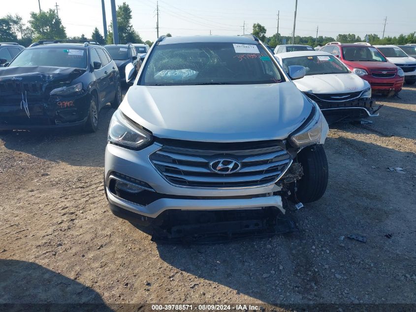 2018 Hyundai Santa Fe Sport 2.4L VIN: 5XYZUDLB9JG566220 Lot: 39788571