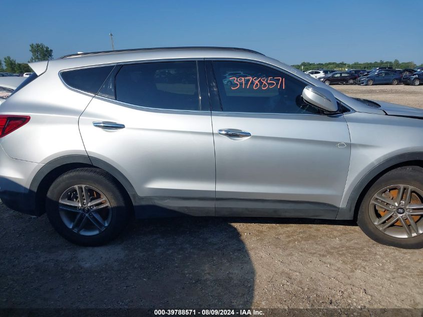 2018 Hyundai Santa Fe Sport 2.4L VIN: 5XYZUDLB9JG566220 Lot: 39788571