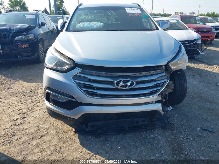 2018 Hyundai Santa Fe Sport 2.4L VIN: 5XYZUDLB9JG566220 Lot: 39788571