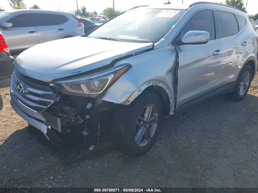 2018 Hyundai Santa Fe Sport 2.4L VIN: 5XYZUDLB9JG566220 Lot: 39788571