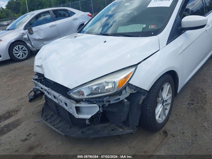 2018 Ford Focus Se VIN: 1FADP3F27JL309008 Lot: 39790354