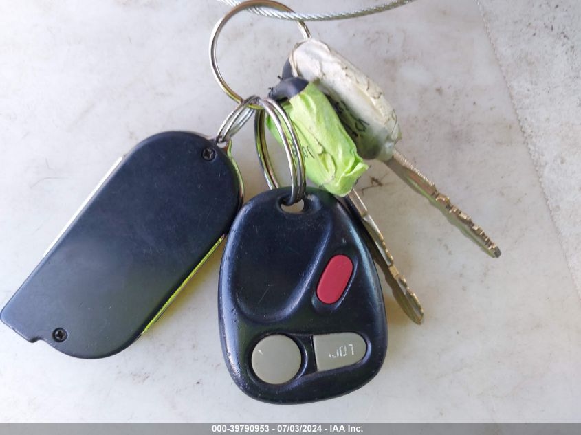 2002 Chevrolet Tahoe Lt VIN: 1GNEK13T72J213690 Lot: 39790953