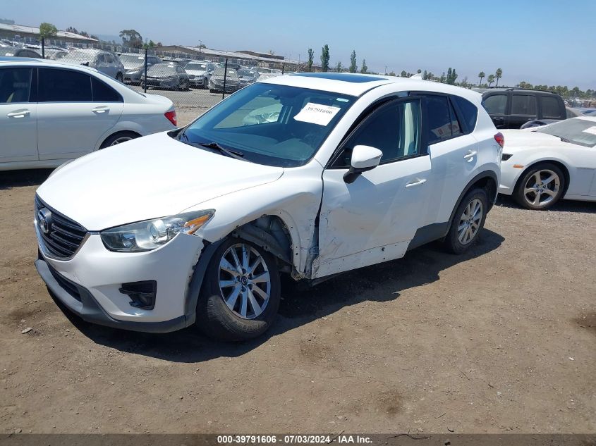 2016 Mazda Cx-5 Touring VIN: JM3KE2CY2G0616811 Lot: 39791606