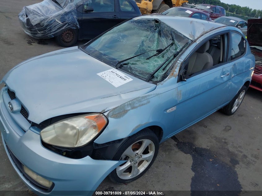 2007 Hyundai Accent Se VIN: KMHCN36C57U045712 Lot: 39791809