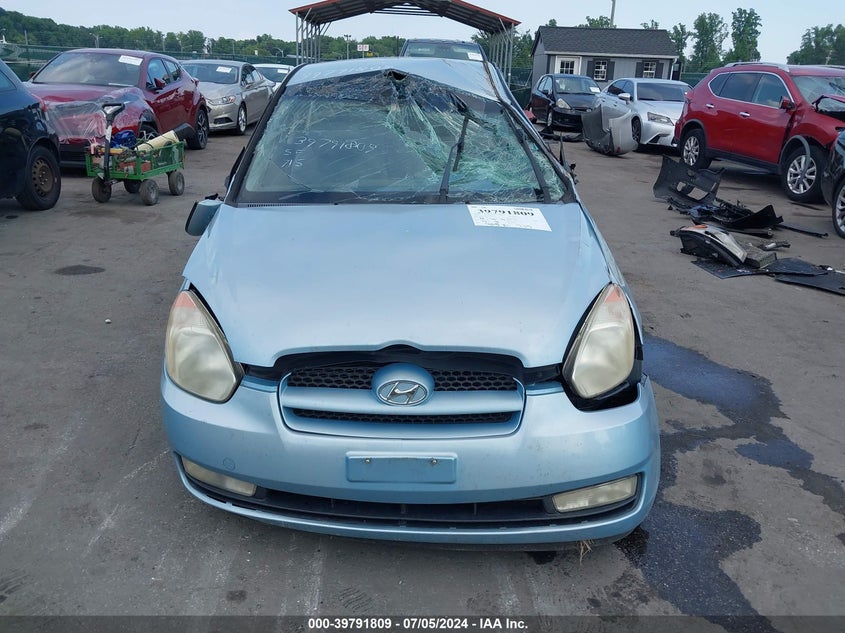 2007 Hyundai Accent Se VIN: KMHCN36C57U045712 Lot: 39791809