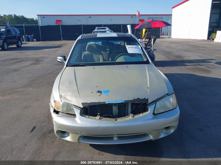 2002 Hyundai Accent L VIN: KMHCF35G72U195525 Lot: 39793891