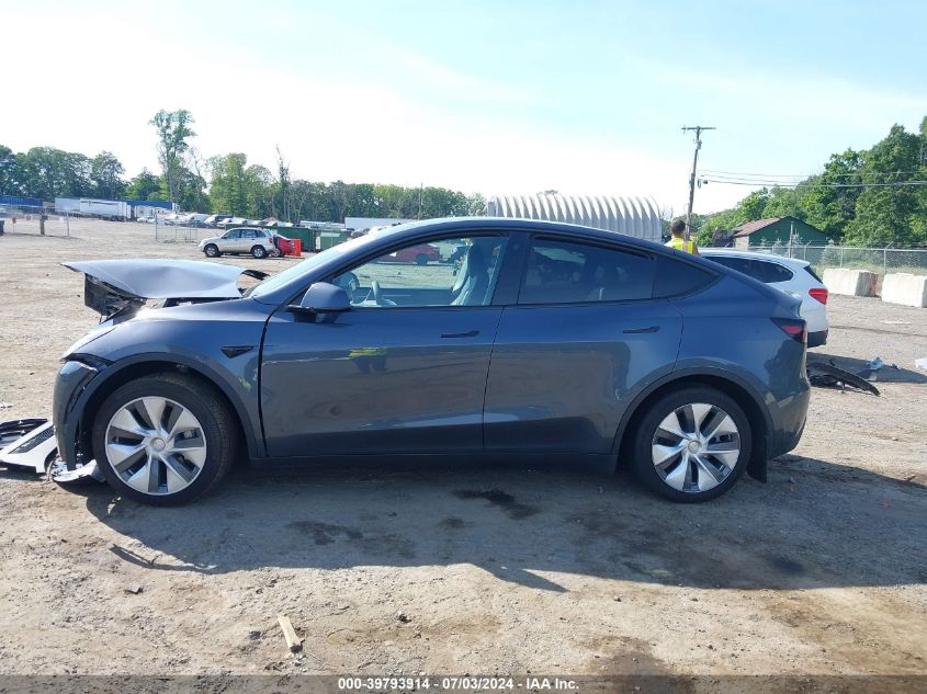 2023 Tesla Model Y Awd/Long Range Dual Motor All-Wheel Drive VIN: 7SAYGDEE0PA119477 Lot: 39793914