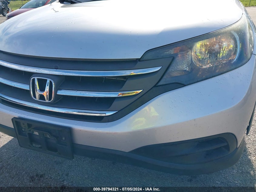 2014 Honda Cr-V Lx VIN: 2HKRM3H33EH533059 Lot: 39794321