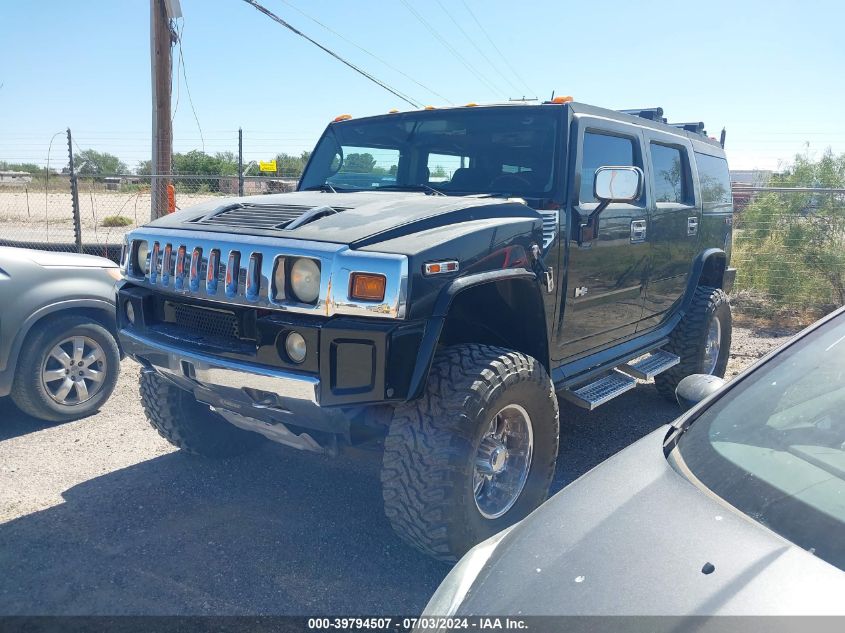 2003 Hummer H2 VIN: 5GRGN23U03H128852 Lot: 39794507