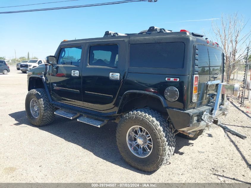 2003 Hummer H2 VIN: 5GRGN23U03H128852 Lot: 39794507