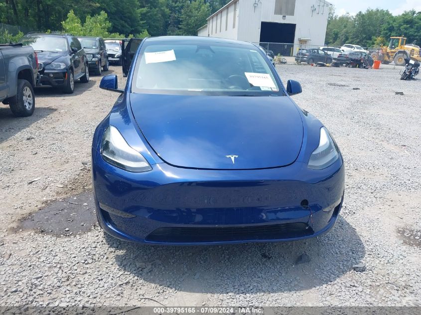 2023 Tesla Model Y Awd/Long Range Dual Motor All-Wheel Drive VIN: 7SAYGDEE9PA206729 Lot: 39795165