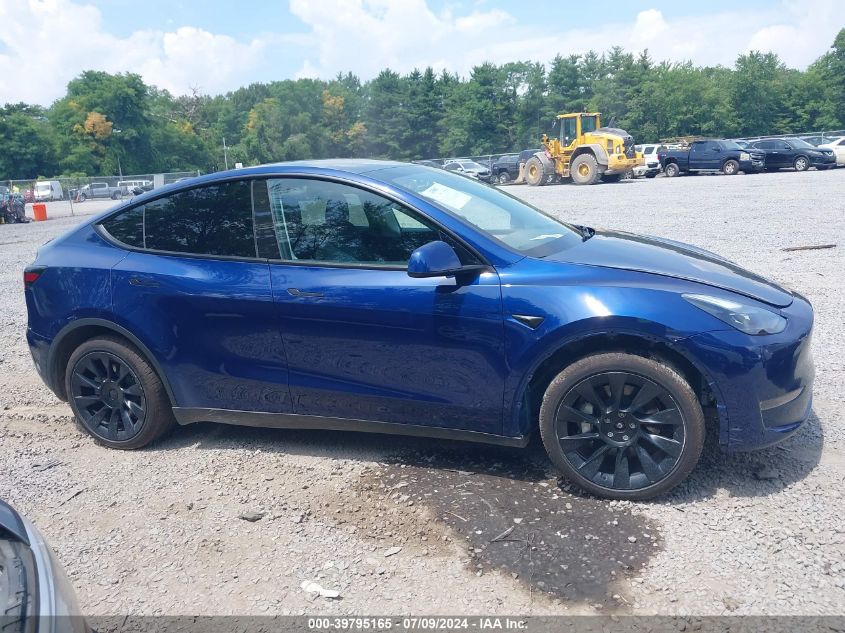 2023 Tesla Model Y Awd/Long Range Dual Motor All-Wheel Drive VIN: 7SAYGDEE9PA206729 Lot: 39795165