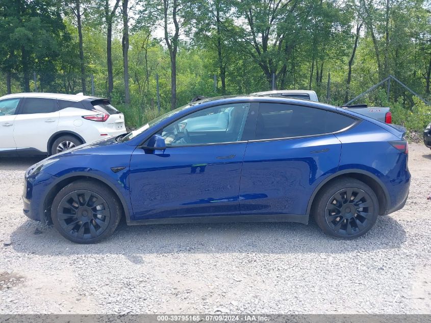 2023 Tesla Model Y Awd/Long Range Dual Motor All-Wheel Drive VIN: 7SAYGDEE9PA206729 Lot: 39795165