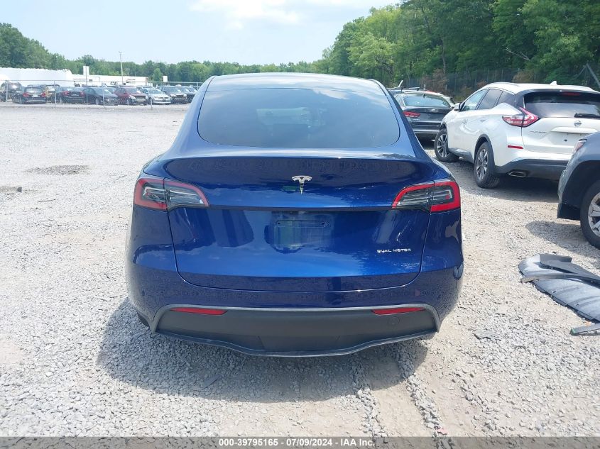 2023 Tesla Model Y Awd/Long Range Dual Motor All-Wheel Drive VIN: 7SAYGDEE9PA206729 Lot: 39795165