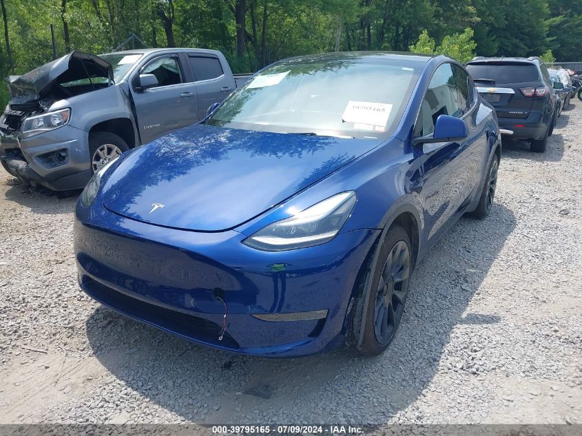 2023 Tesla Model Y Awd/Long Range Dual Motor All-Wheel Drive VIN: 7SAYGDEE9PA206729 Lot: 39795165