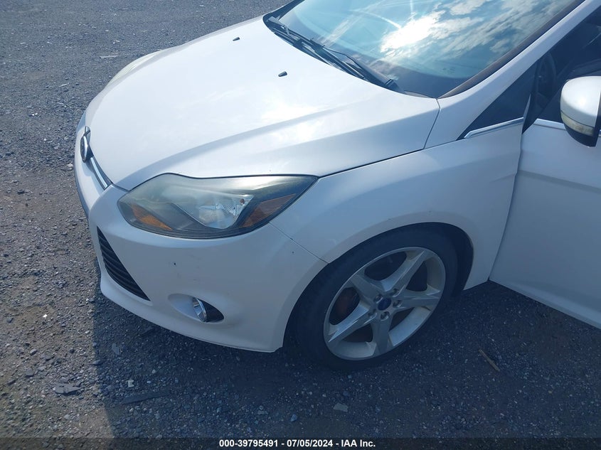 2013 Ford Focus Titanium VIN: 1FADP3J29DL199137 Lot: 39795491