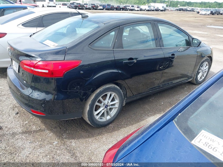 VIN 1FADP3F21JL328671 2018 FORD FOCUS SE