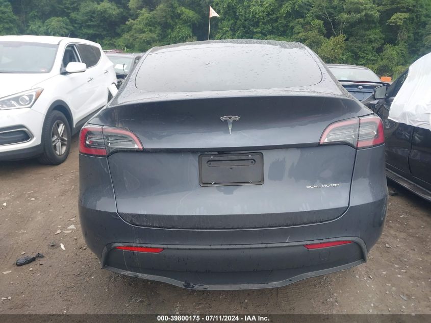 2023 Tesla Model Y Awd/Long Range Dual Motor All-Wheel Drive VIN: 7SAYGDEE4PA194084 Lot: 39800175