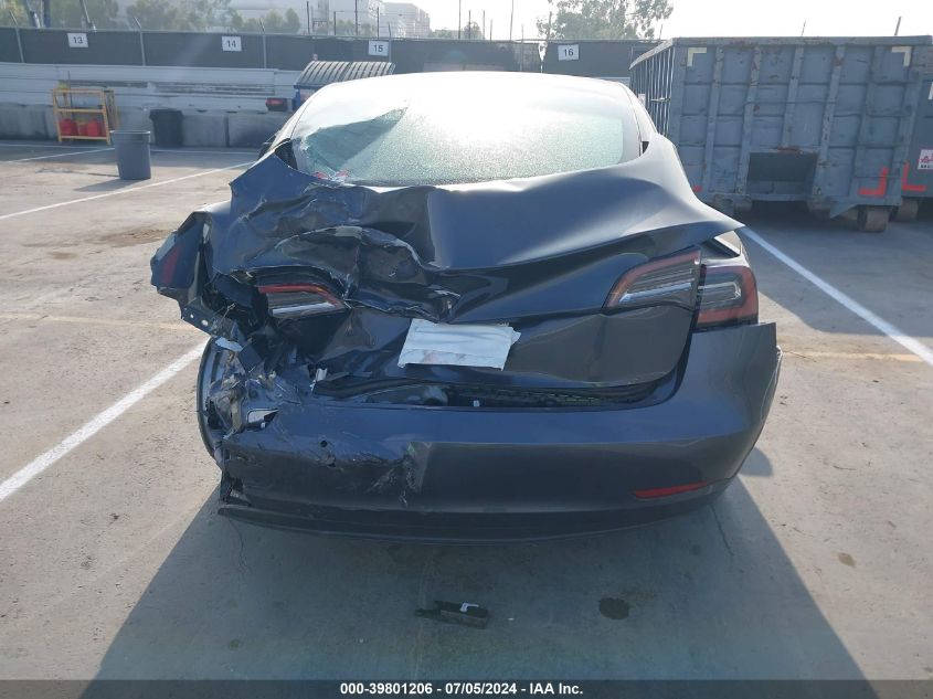 2021 Tesla Model 3 Standard Range Plus Rear-Wheel Drive VIN: 5YJ3E1EA7MF977665 Lot: 39801206