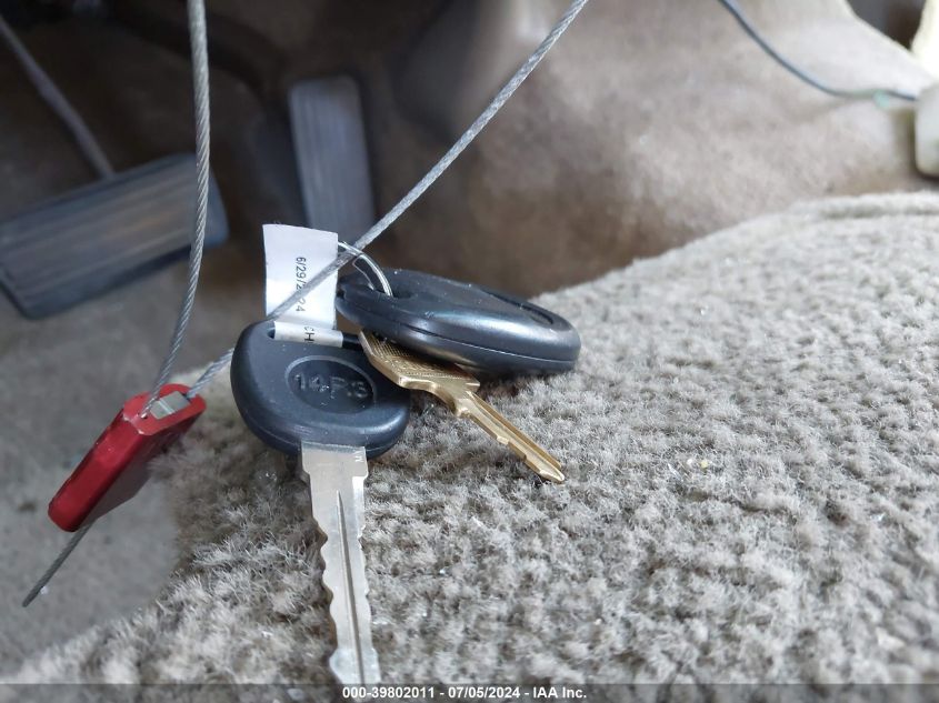 2003 Chevrolet Tahoe Ls VIN: 1GNEC13V73J305897 Lot: 39802011