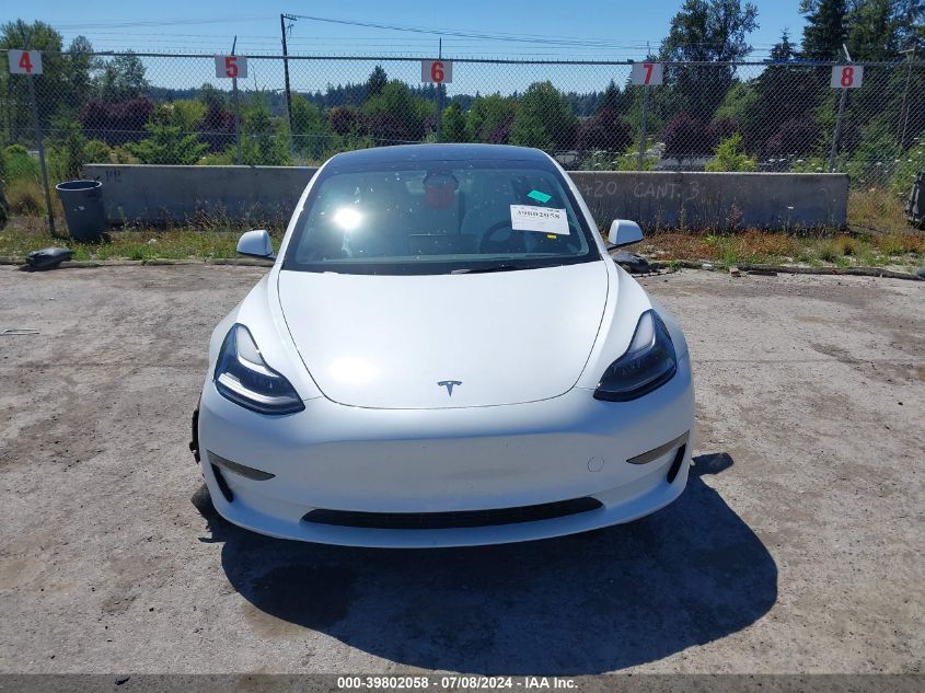 2023 Tesla Model 3 Long Range Dual Motor All-Wheel Drive VIN: 5YJ3E1EB0PF694554 Lot: 39802058