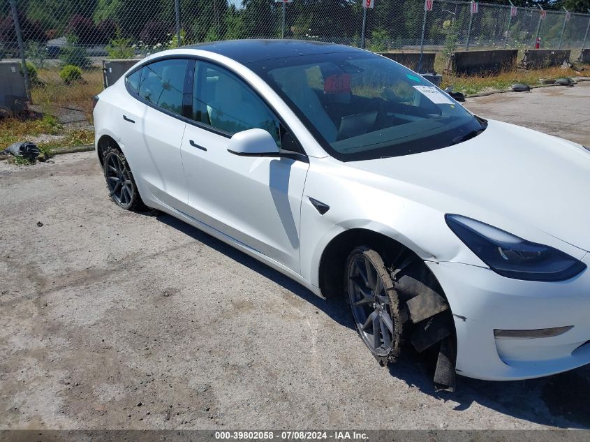 2023 Tesla Model 3 Long Range Dual Motor All-Wheel Drive VIN: 5YJ3E1EB0PF694554 Lot: 39802058