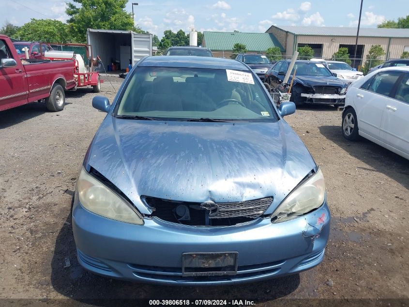 2003 Toyota Camry Le VIN: 4T1BE30K33U713528 Lot: 39806518