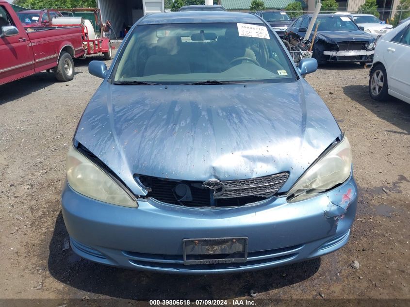 2003 Toyota Camry Le VIN: 4T1BE30K33U713528 Lot: 39806518