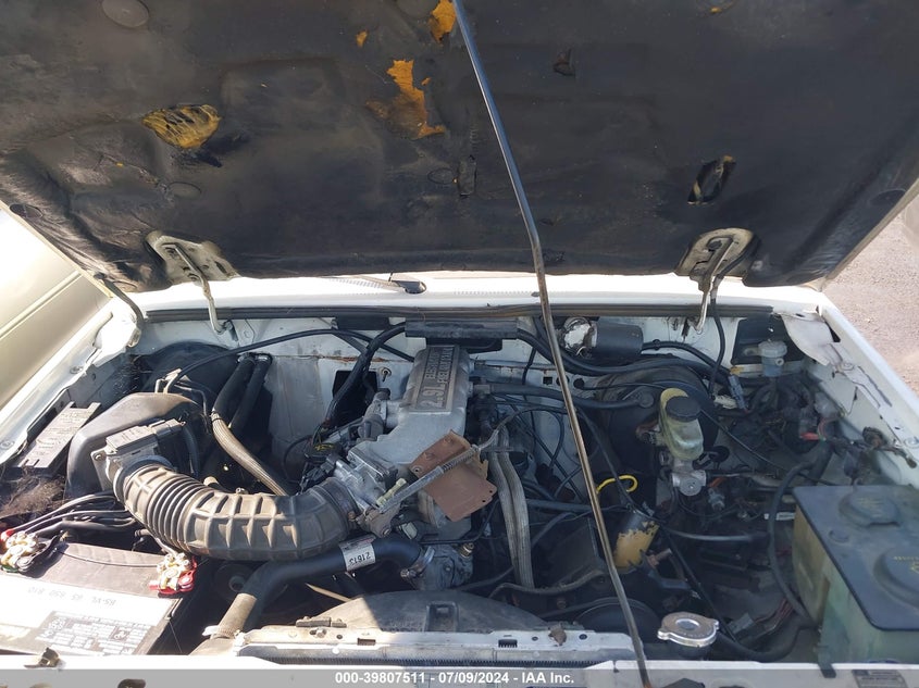 1990 Ford Ranger Super Cab VIN: 1FTCR14TXLPB71640 Lot: 39807511