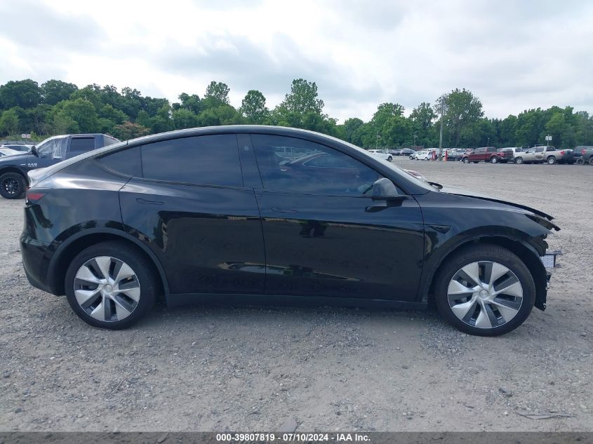 2023 Tesla Model Y Awd/Long Range Dual Motor All-Wheel Drive VIN: 7SAYGDEE0PA141205 Lot: 39807819